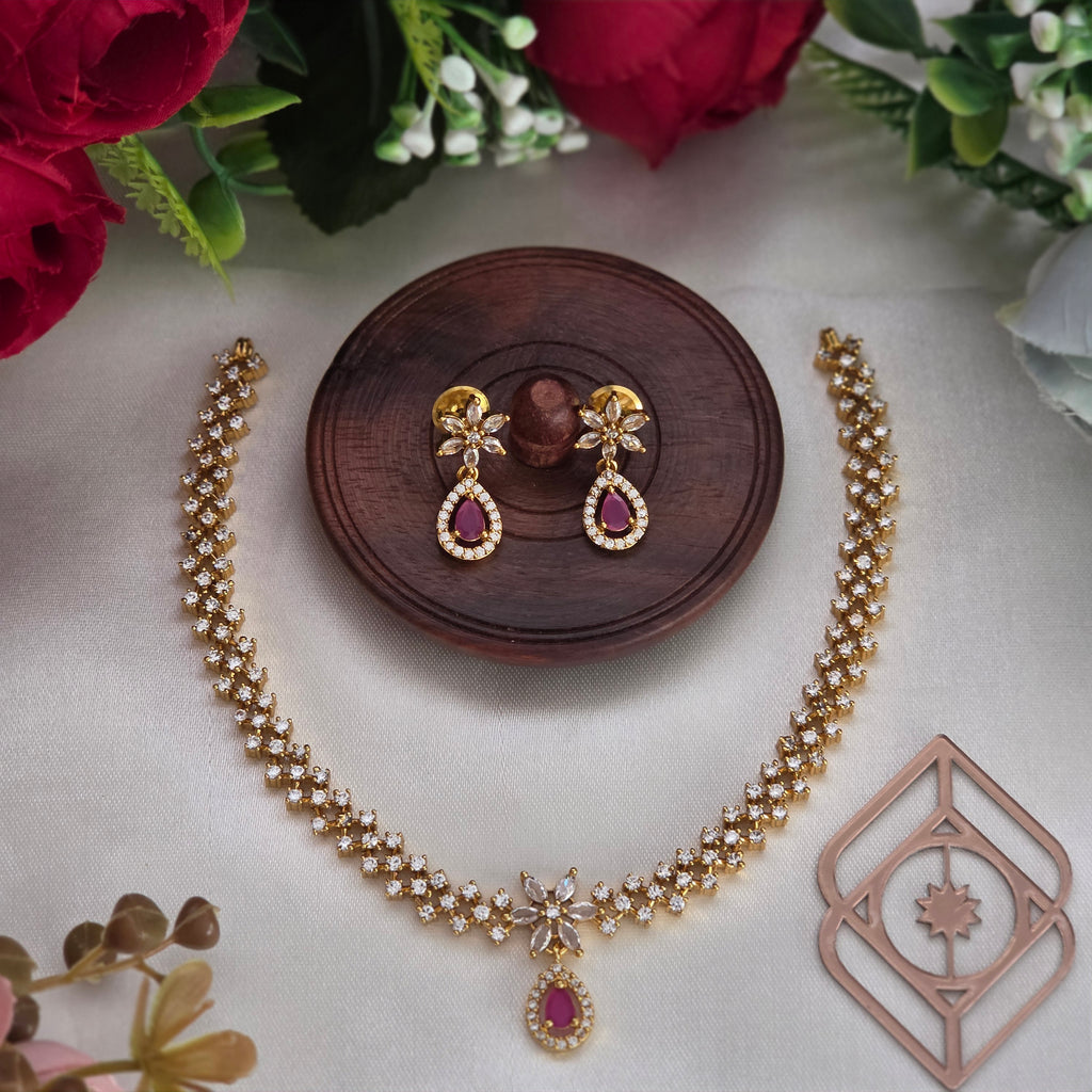 Short necklace, set with American Diamond stones and ruby, floral motif. Ahankaraka AKSN39.