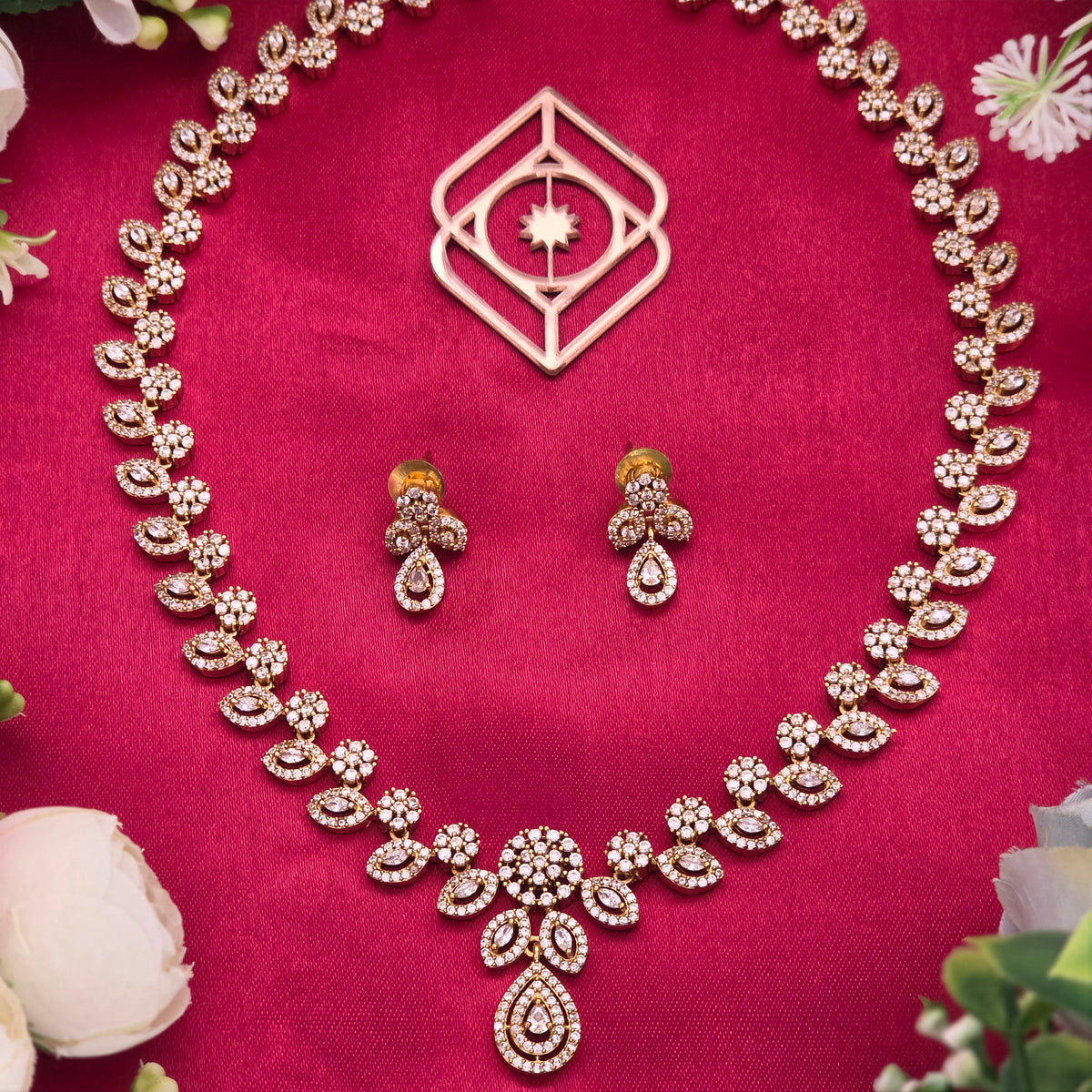 Mid length necklace, set with American Diamond stones, floral motif. Ahankaraka AKMLN14.