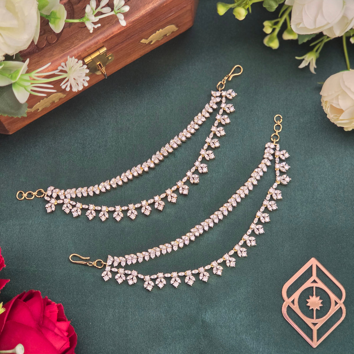 Ear chains, set with American Diamond stones. Ahankaraka AKECH33.
