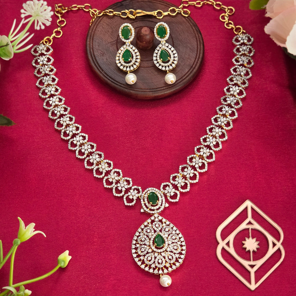 Short necklace, set with American Diamond stones and emerald, floral motif. Ahankaraka AKSN22.