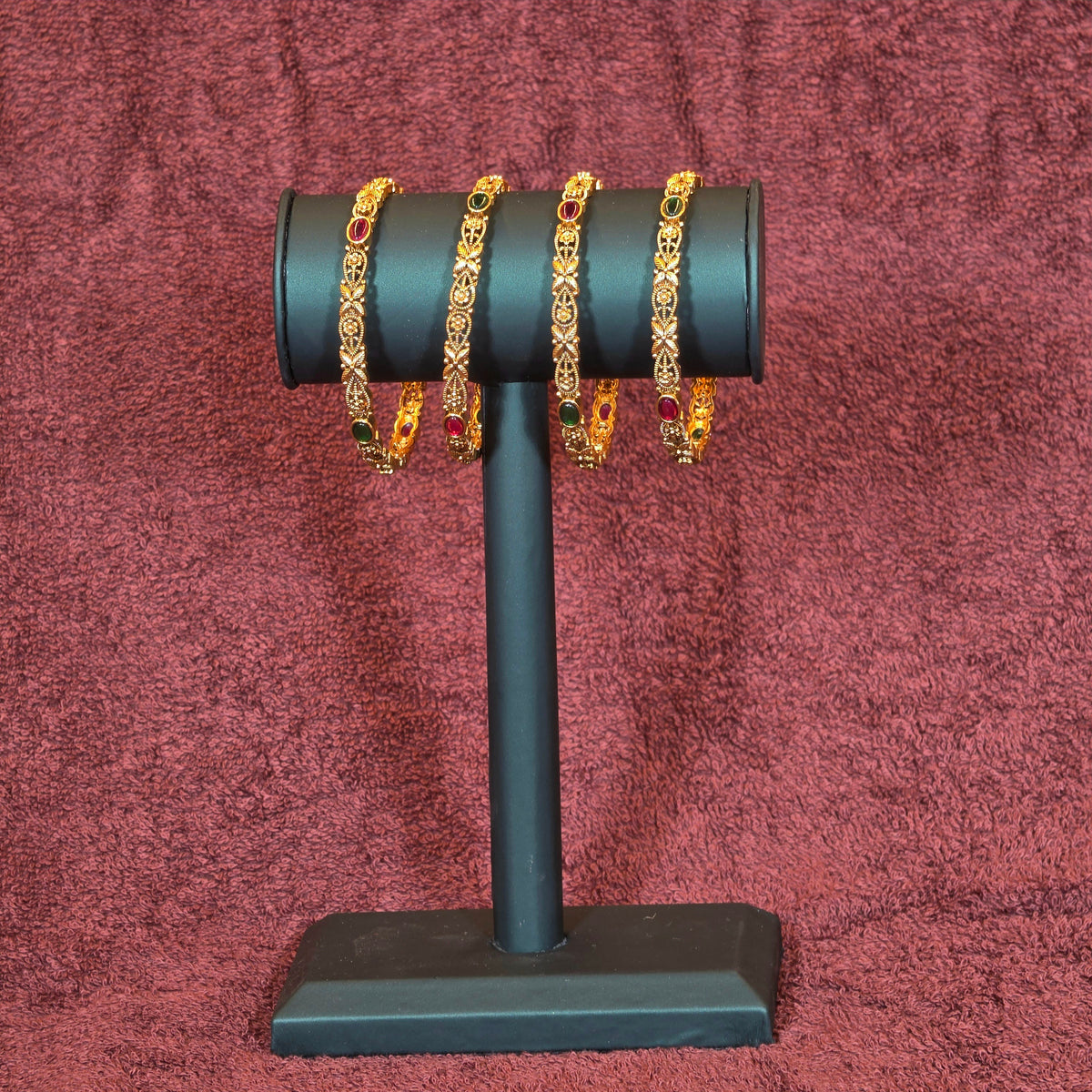 Bangles, floral motif and multi stone. Ahankaraka AKBA101.