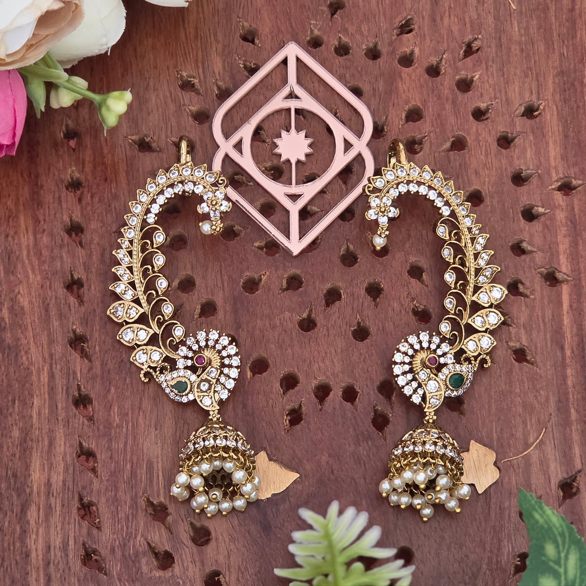 Ear cuff, set with American Diamond stones and peacock motif. Ahankaraka AKEC19.