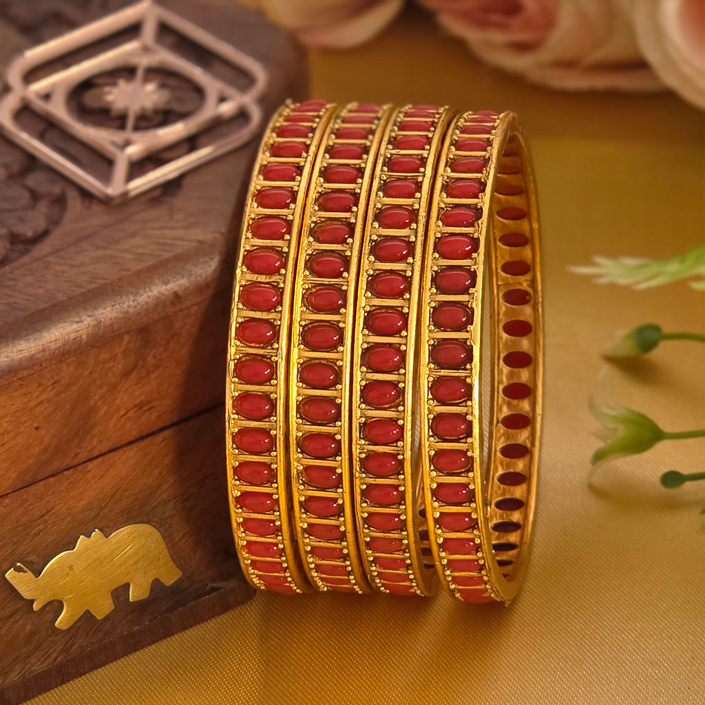 Bangles, coral beads. Ahankaraka AKBA58.