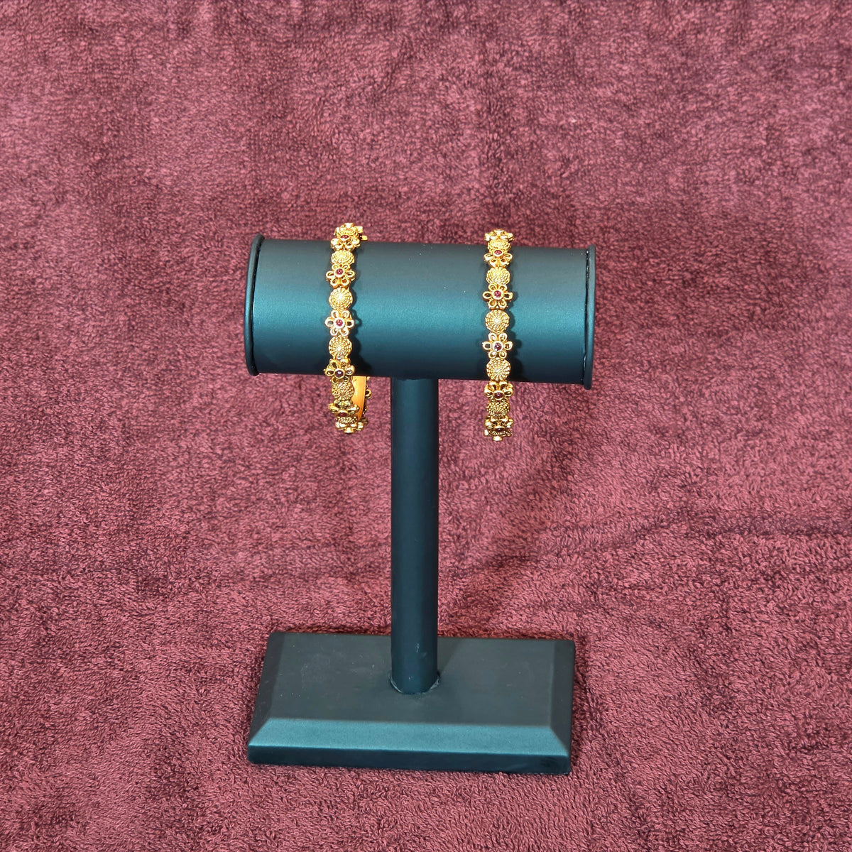 Bangles, set with kemp, floral motif. Ahankaraka AKBA116.