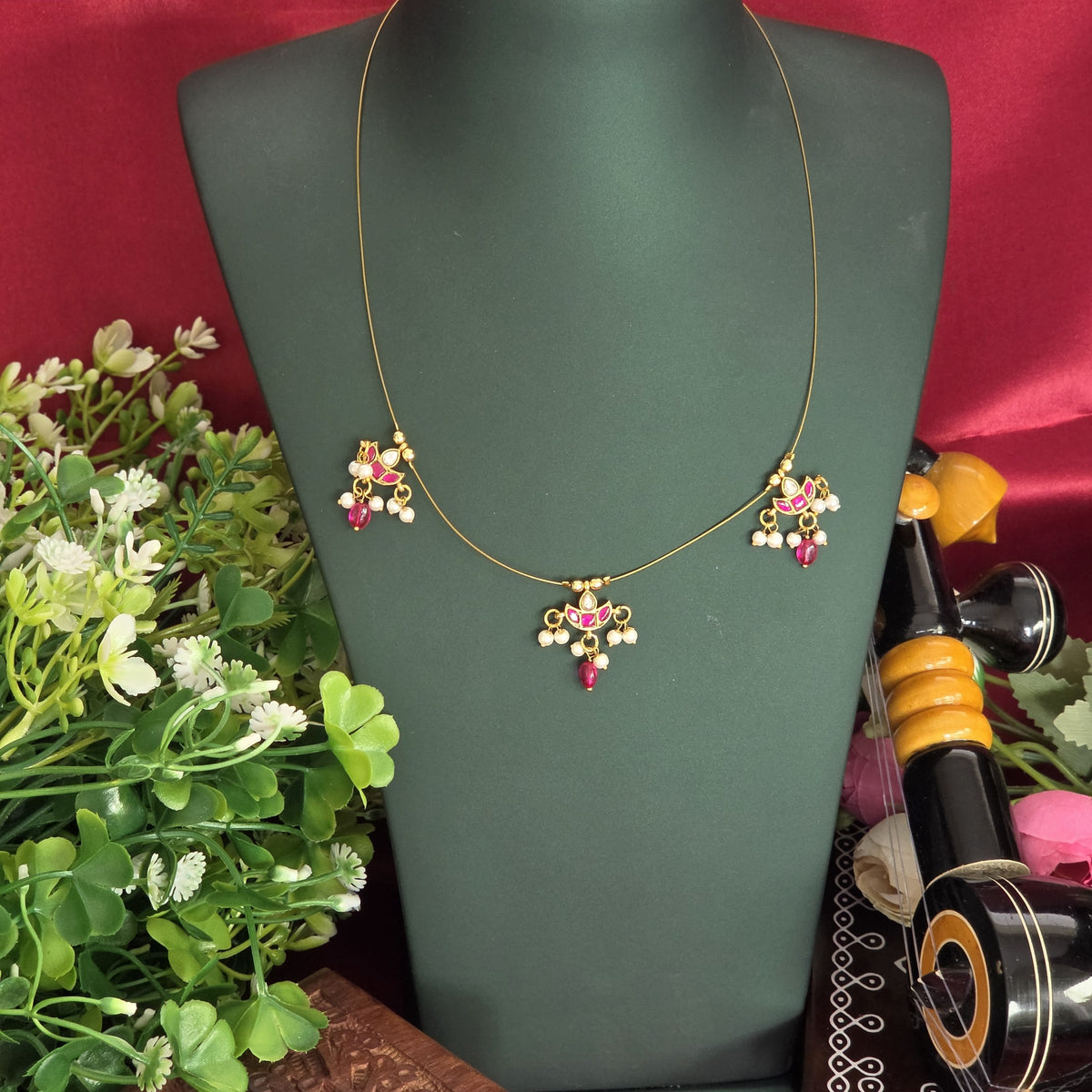 Invisible necklace, ruby motif. Ahankaraka AKIN05.