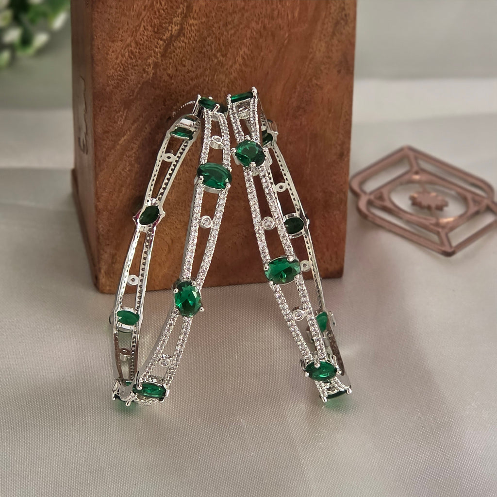 Bangles, set with emerald and white stones. Ahankaraka AKBA51.