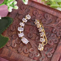 Ear cuff, climber and white stone motif. Ahankaraka AKEC23.