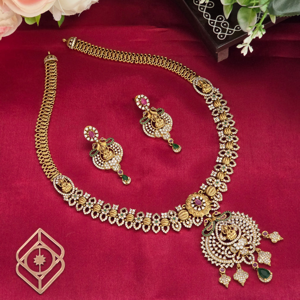 Long necklace, set with cubic zirconia, Lakshmi and peacock motifs. Ahankaraka AKLN12.