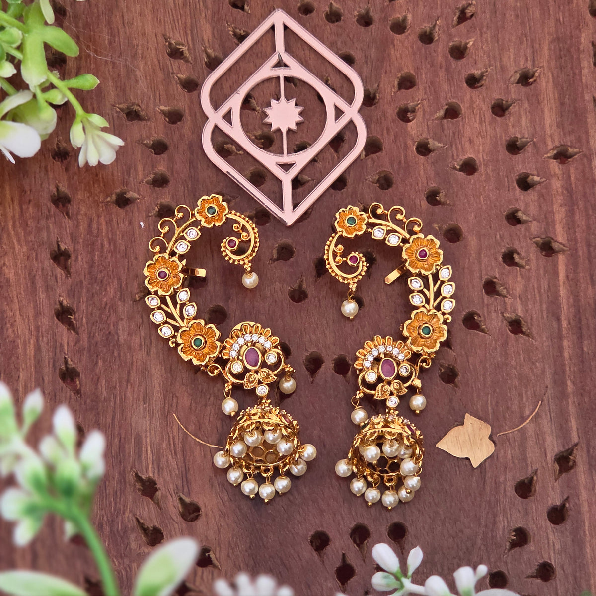 Ear cuff, set with pearls, floral motif and AD stones. Ahankaraka AKEC06.