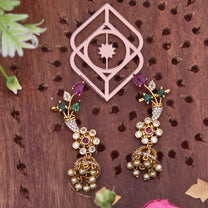 Ear cuff, set with stones in several colours, floral motif. Ahankaraka AKEC04.
