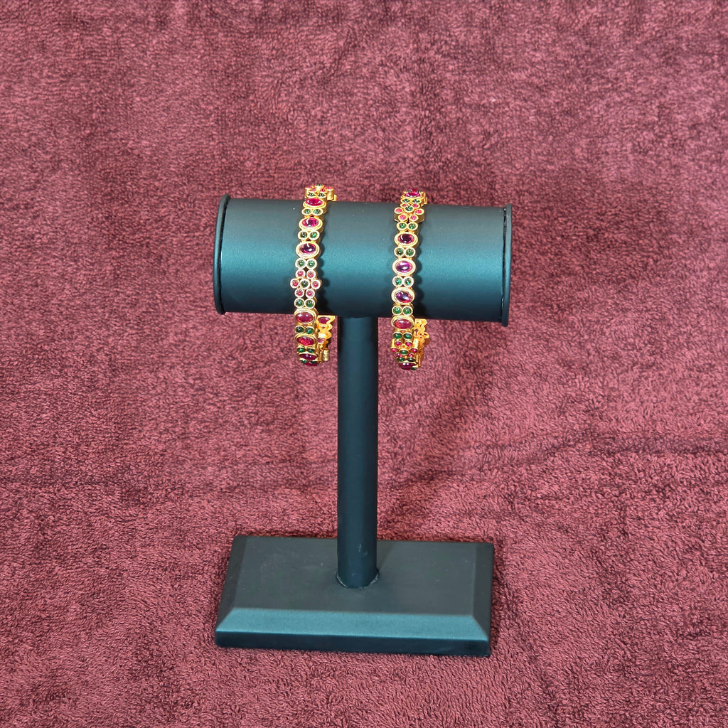 Bangles, set with kemp, floral motif. Ahankaraka AKBA80.