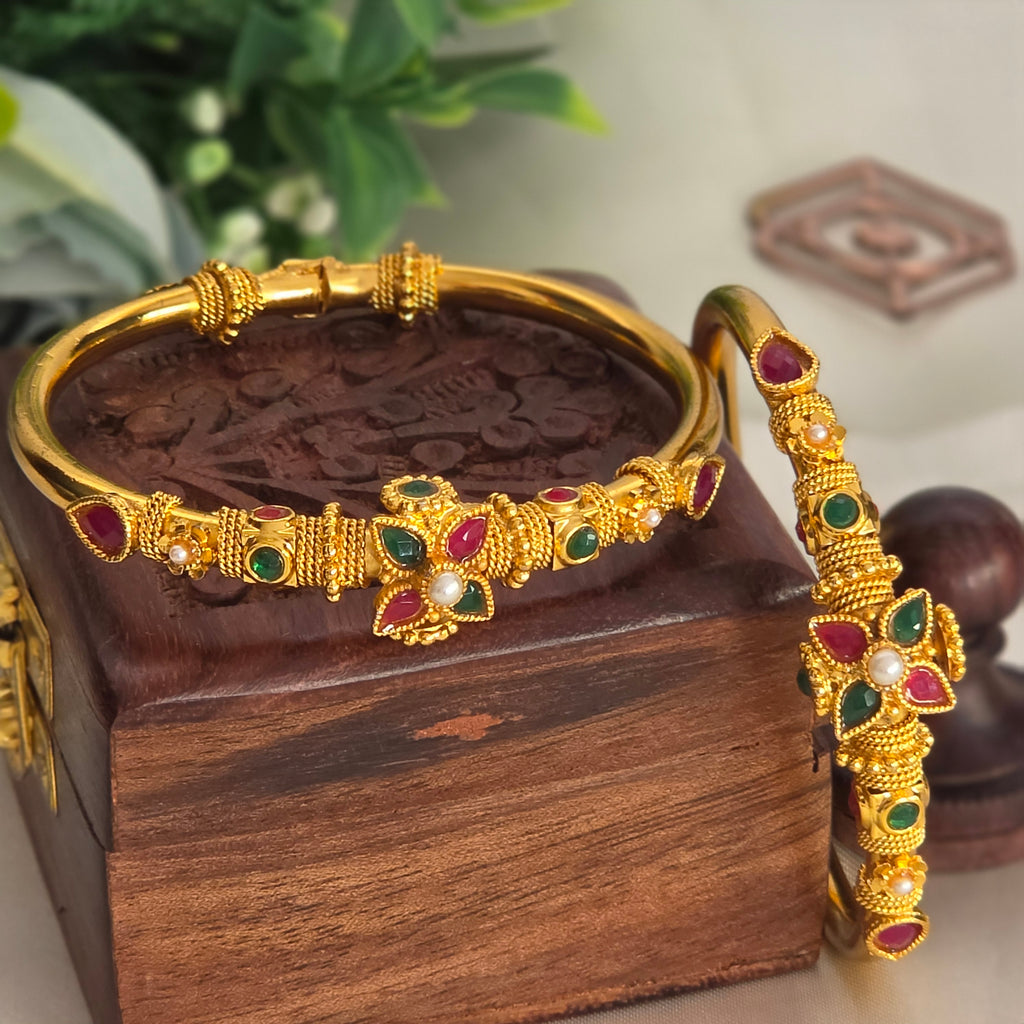 Bangles, set with stones in several colours, floral motif. Ahankaraka AKBA16.