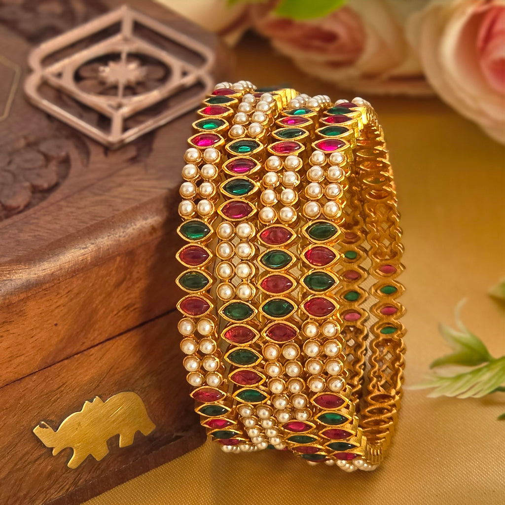 Bangles, set with kemp and pearls. Ahankaraka AKBA73.