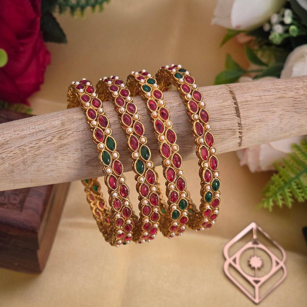 Bangles, set with kemp and pearls. Ahankaraka AKBA70.