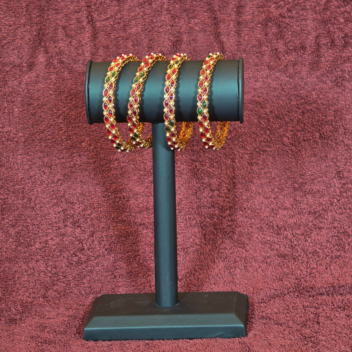 Bangles, set with kemp and pearls. Ahankaraka AKBA70.
