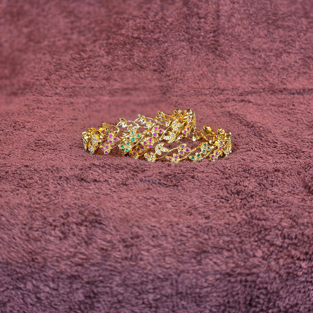 Bangles, set with stones in several colours. Ahankaraka AKBA33.