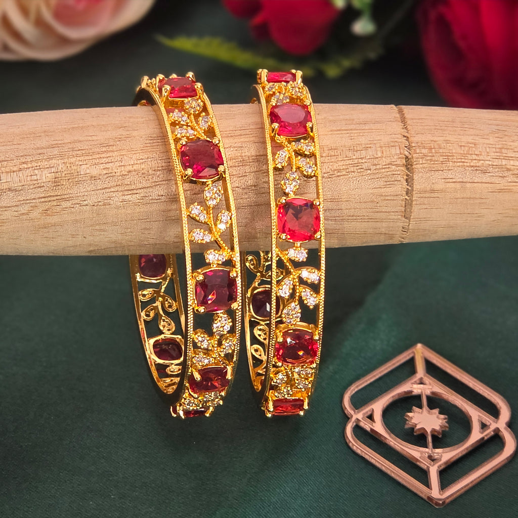 Bangles, set with ruby-toned stones and leaf motif. Ahankaraka AKBA05.