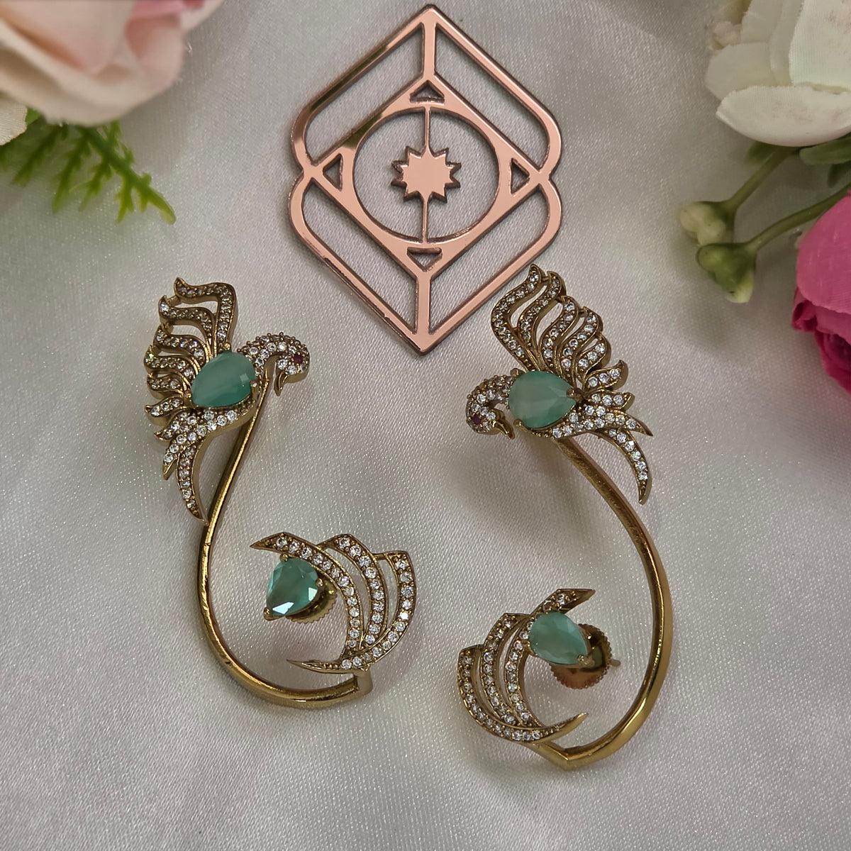 Ear cuff, peacock motif. Ahankaraka AKEC17.