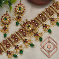 Choker necklace, set with kemp and green beads, floral motif. Ahankaraka AKCK20.