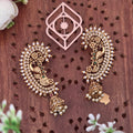 Ear cuff, set with American Diamond stones, peacock motif. Ahankaraka AKEC14.