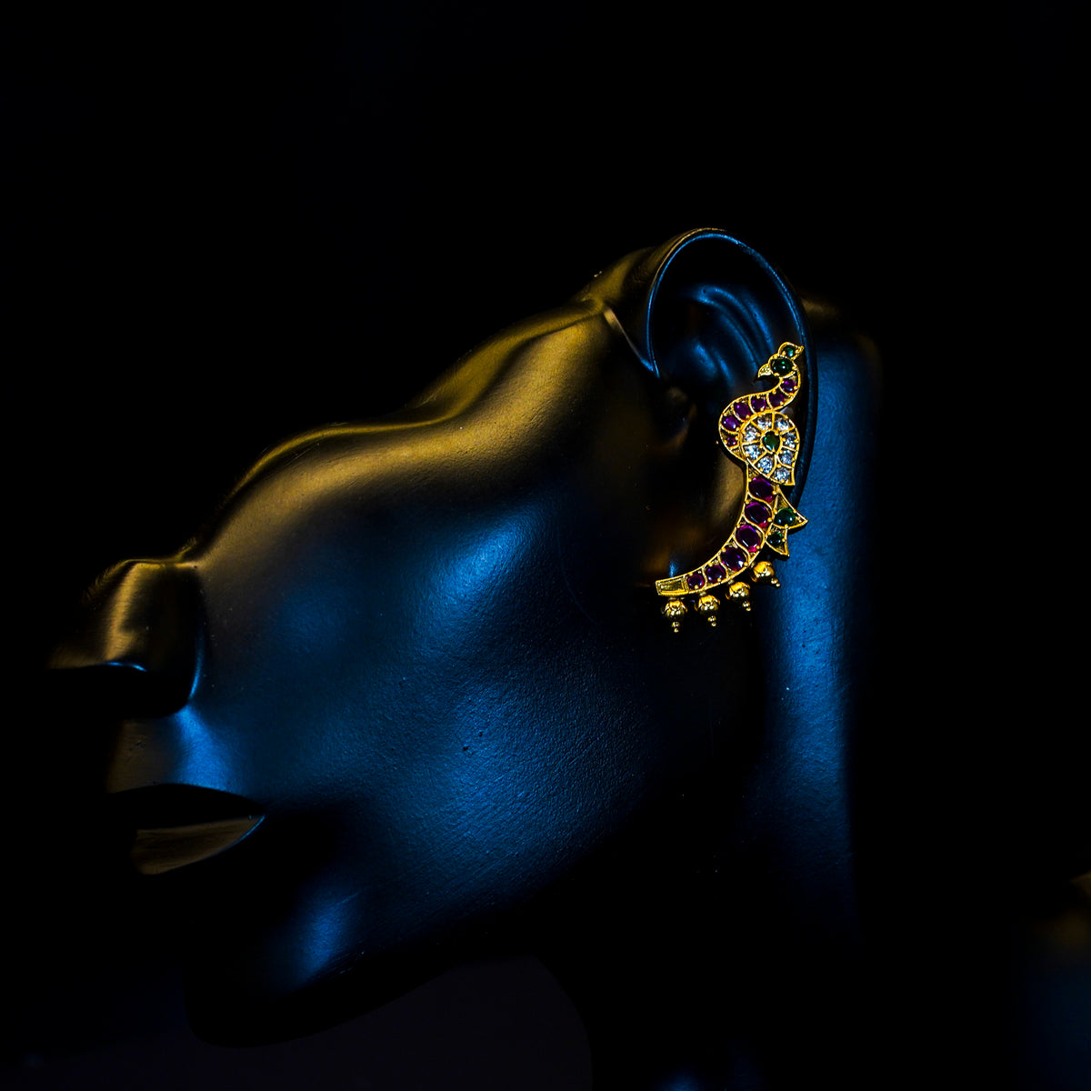 Ear cuff, set with kemp, peacock motif. Ahankaraka AKEC09.