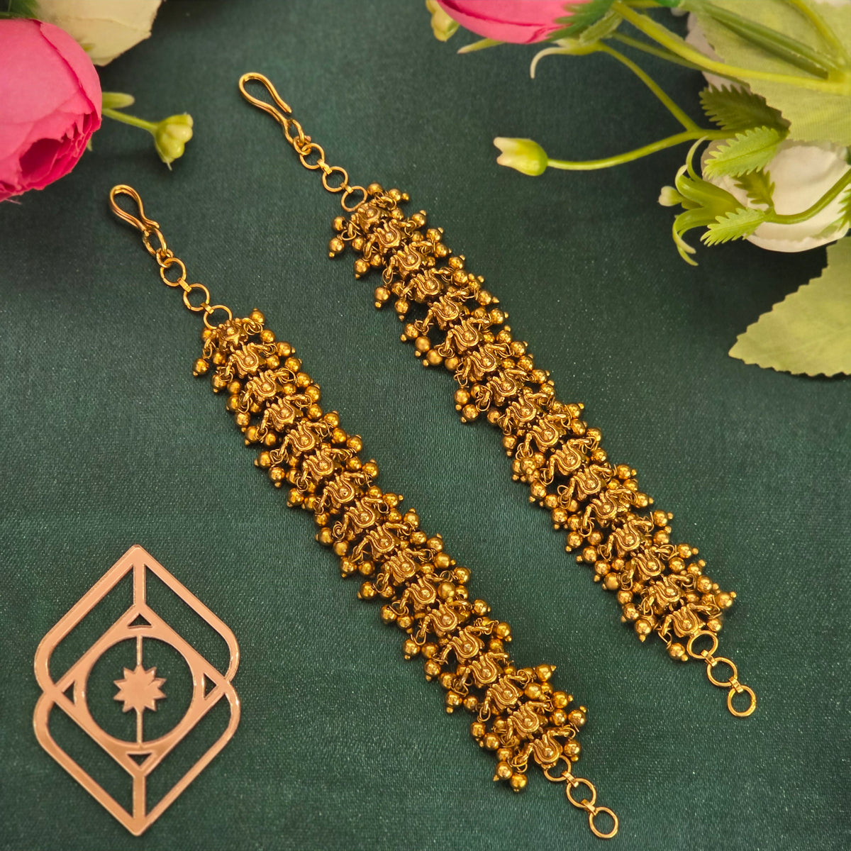 Ear chains, set with gold beads, peacock motif. Ahankaraka AKECH25.
