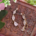 Ear cuff. climber and white stone. Ahankaraka AKEC20.