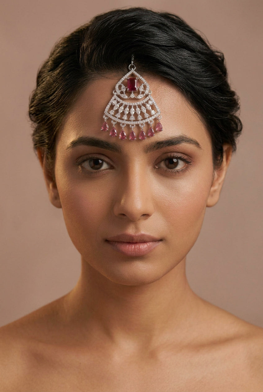 Maang tikka, set with American Diamond stones and ruby. Ahankaraka AKMT29.
