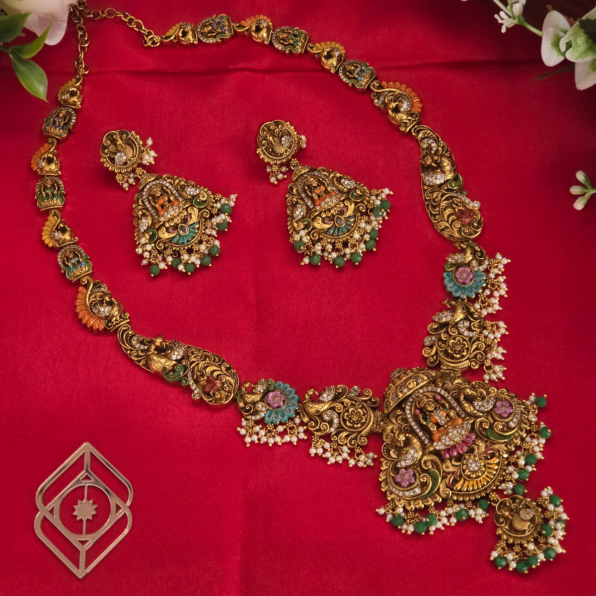 Long necklace, set with enamel paint. Lakshmi and peacock motifs. Ahankaraka AKLN04.