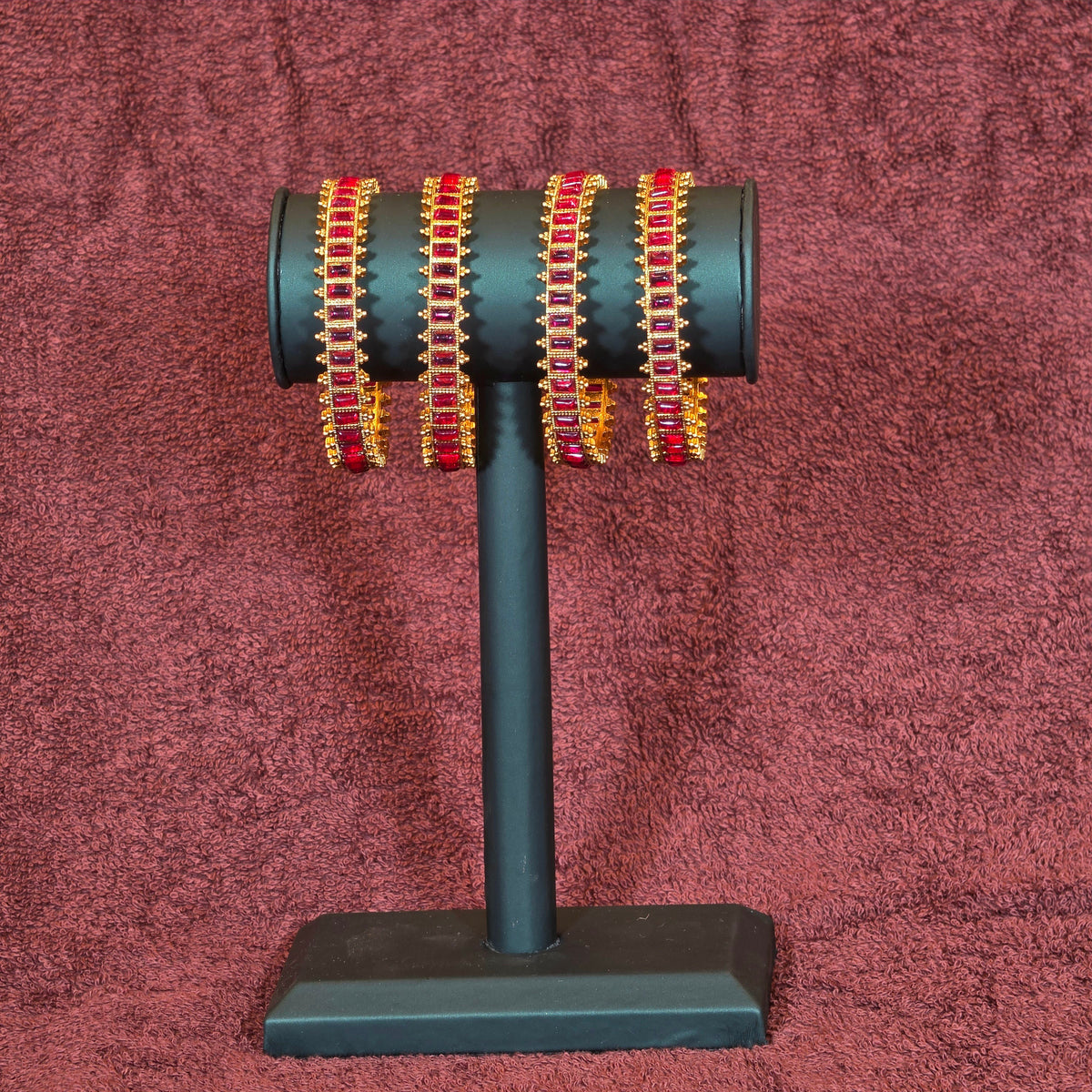Bangles, set with kemp. Ahankaraka AKBA56.