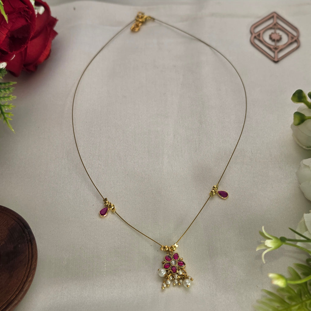 Invisible necklace, floral motif. Ahankaraka AKIN03.