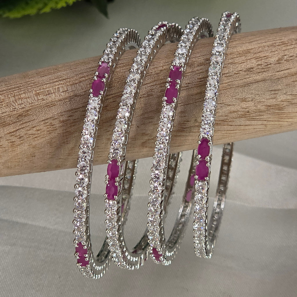 Bangles, set with ruby and white stones. Ahankaraka AKBA53.