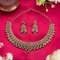 Choker necklace, set with American diamond stones and emerald-toned stones. Ahankaraka AKCK04.